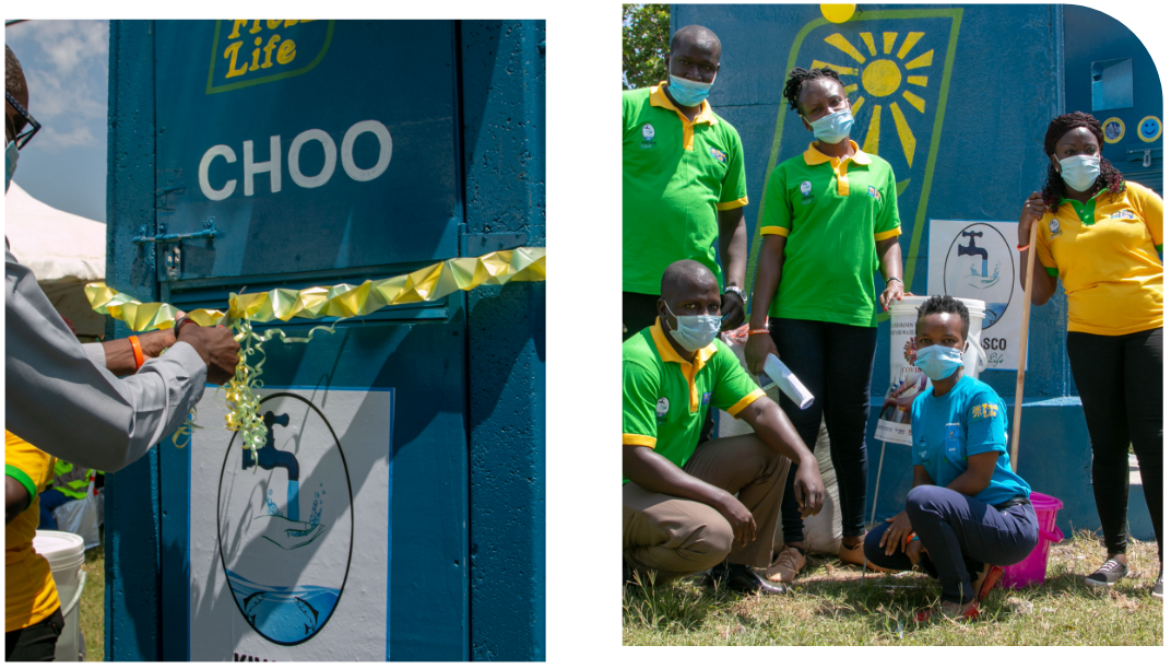 Fresh life staff standing outside a Fresh life toilet